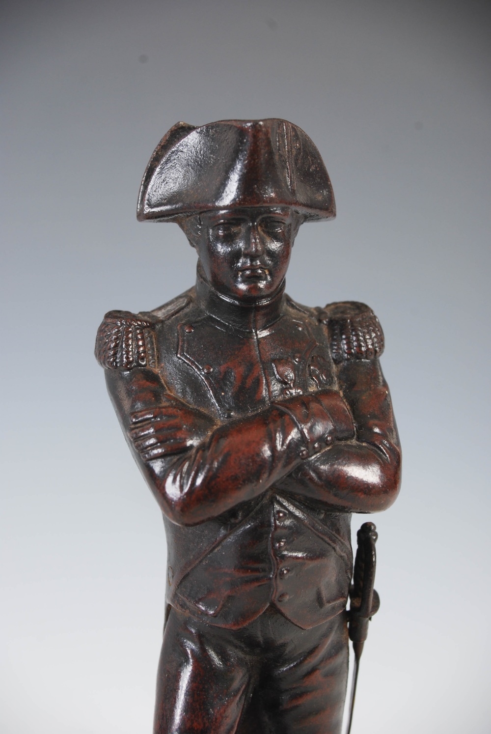 A bronzed spelter figure of Napoleon Bonaparte, modelled standing on square plinth base with oval - Image 6 of 7