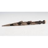 A late 19th century Scottish white metal mounted dirk, the carved wood handle with entwined