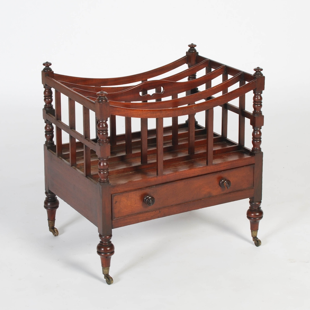 A 19th century mahogany Canterbury, the rectangular top with four divisions above a single
