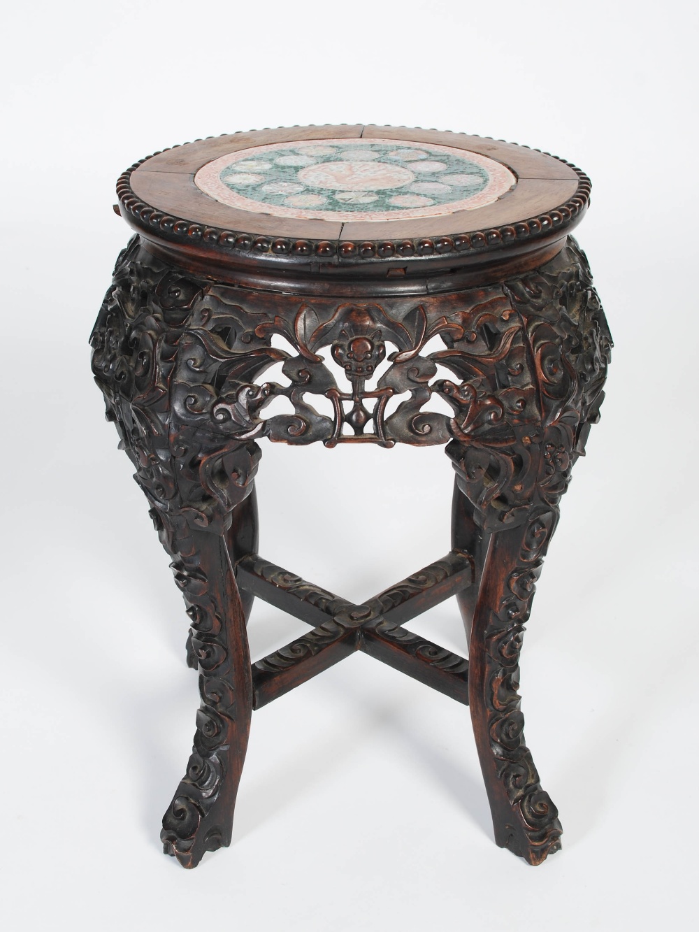 A Chinese dark wood jardiniere stand, Qing Dynasty, the circular top with a round porcelain panel - Image 7 of 7