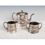 A late 19th century Chinese electroplated three piece tea set, of tapered oval form decorated in