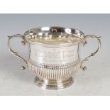 An Edwardian silver twin handled porringer, London, 1907, makers mark of JW over CW, part