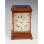 A late 19th century mahogany cased mantle clock, Stewart Dawson & Co., London, the silvered dial