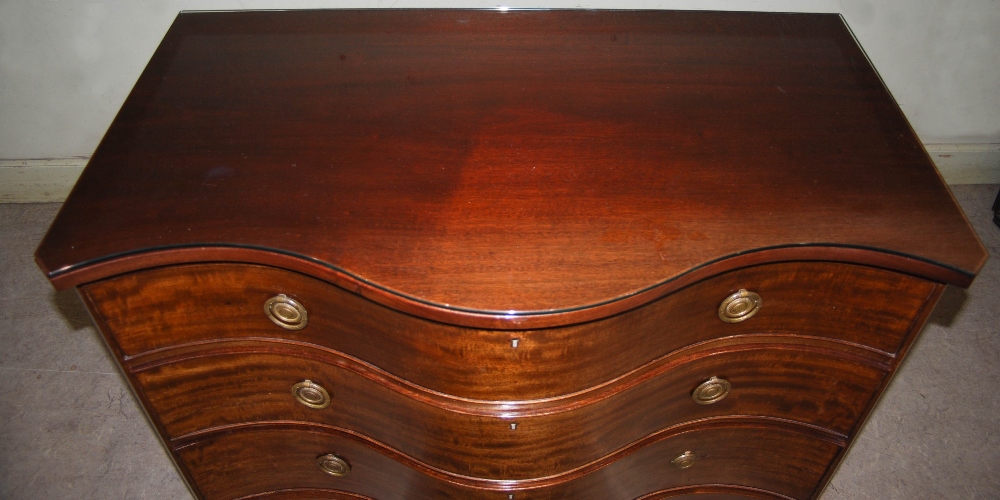 An early 20th century George III style mahogany serpentine chest, the shaped top above four long - Image 2 of 12