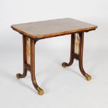 A 19th century rosewood and parcel gilt Regency style centre table, the rectangular top with re-