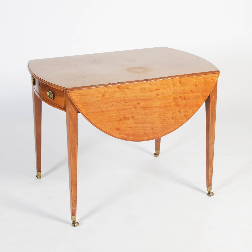 A 19th century mahogany and boxwood lined Pembroke table, the oval top with twin drop leaves over