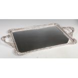 An Edwardian silver twin handled serving tray, Sheffield, 1902, makers mark of J.D&S for James Dixon
