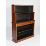 A 19th century rosewood and parcel gilt open bookcase, the rectangular top with a pierced three