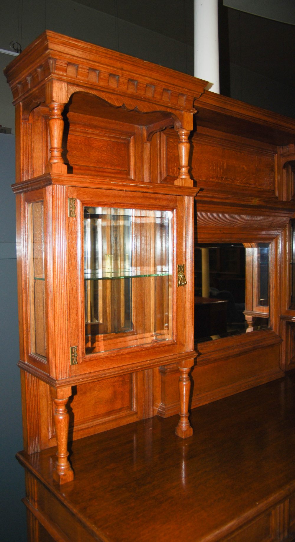 A late 19th century oak dining room room suite, comprising; an extending dining table enclosing four - Image 4 of 9