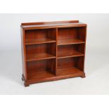 An early 20th century mahogany open bookcase, probably Whytock & Reid, Edinburgh, fitted with four