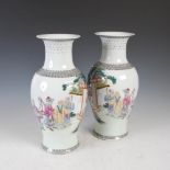 A pair of Chinese porcelain famille rose vases, Republican Period, decorated with continuous scene