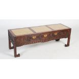A Chinese dark wood Kang table, late Qing Dynasty, the rectangular top with three mottled yellow