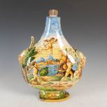 An Italian Maiolica pottery pear shaped flask, decorated with classical figures and putti in a