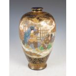 A Japanese blue ground Satsuma pottery vase, Meiji Period, decorated in relief with two shaped