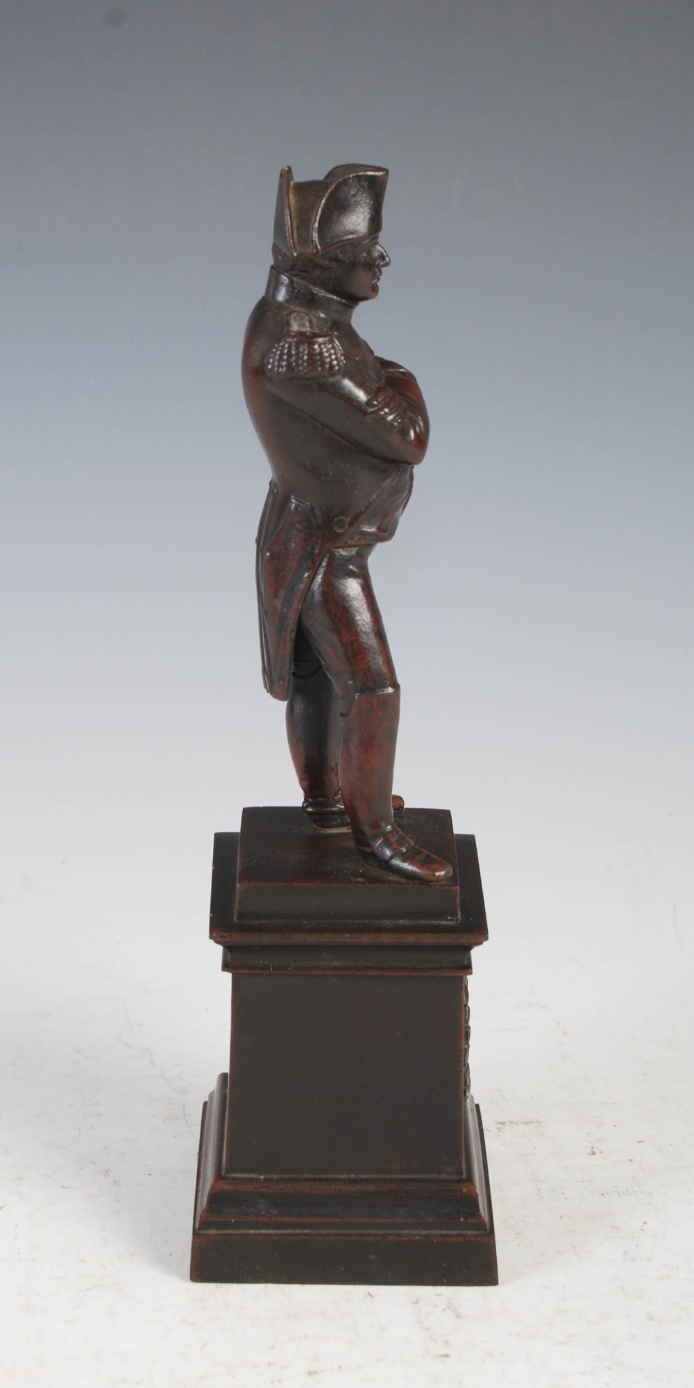 A bronzed spelter figure of Napoleon Bonaparte, modelled standing on square plinth base with oval - Image 4 of 7