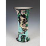 A Chinese porcelain black ground famille verte vase, late 19th/early 20th century, decorated with