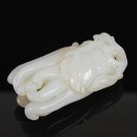 A Chinese white jade carving of a finger citrus, Qing Dynasty, 5.5cm long.