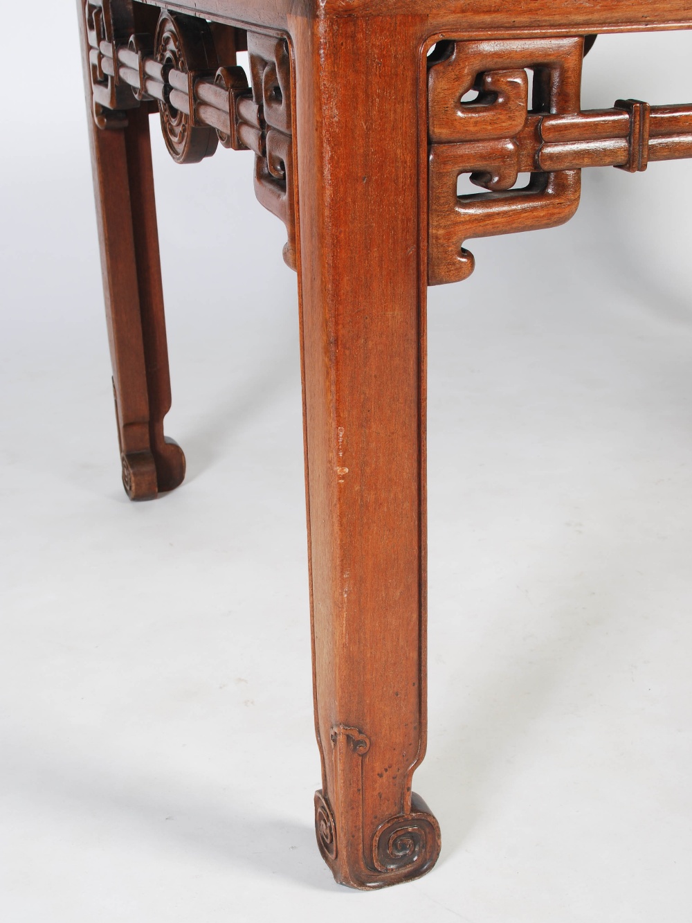 A Chinese huanghuali writing table, Qing Dynasty, the rectangular top above a pierced and scroll - Image 3 of 6