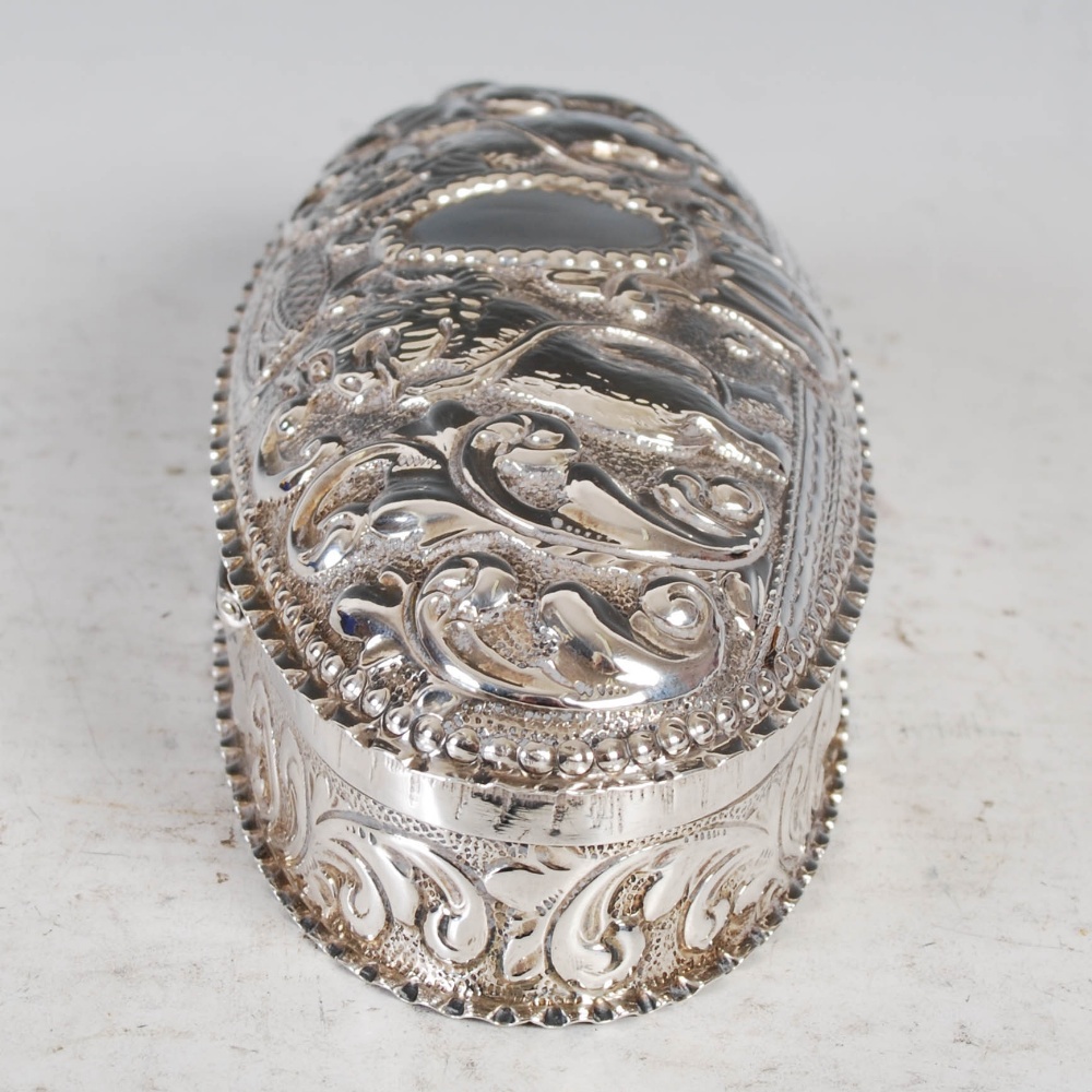 A Victorian silver oval shaped box and cover, Birmingham, 1891, makers mark of H&A, with embossed - Image 4 of 9
