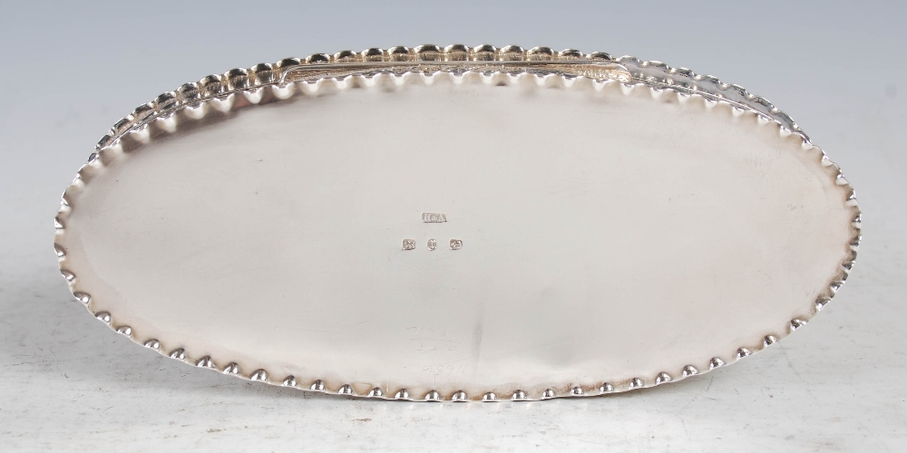 A Victorian silver oval shaped box and cover, Birmingham, 1891, makers mark of H&A, with embossed - Image 8 of 9