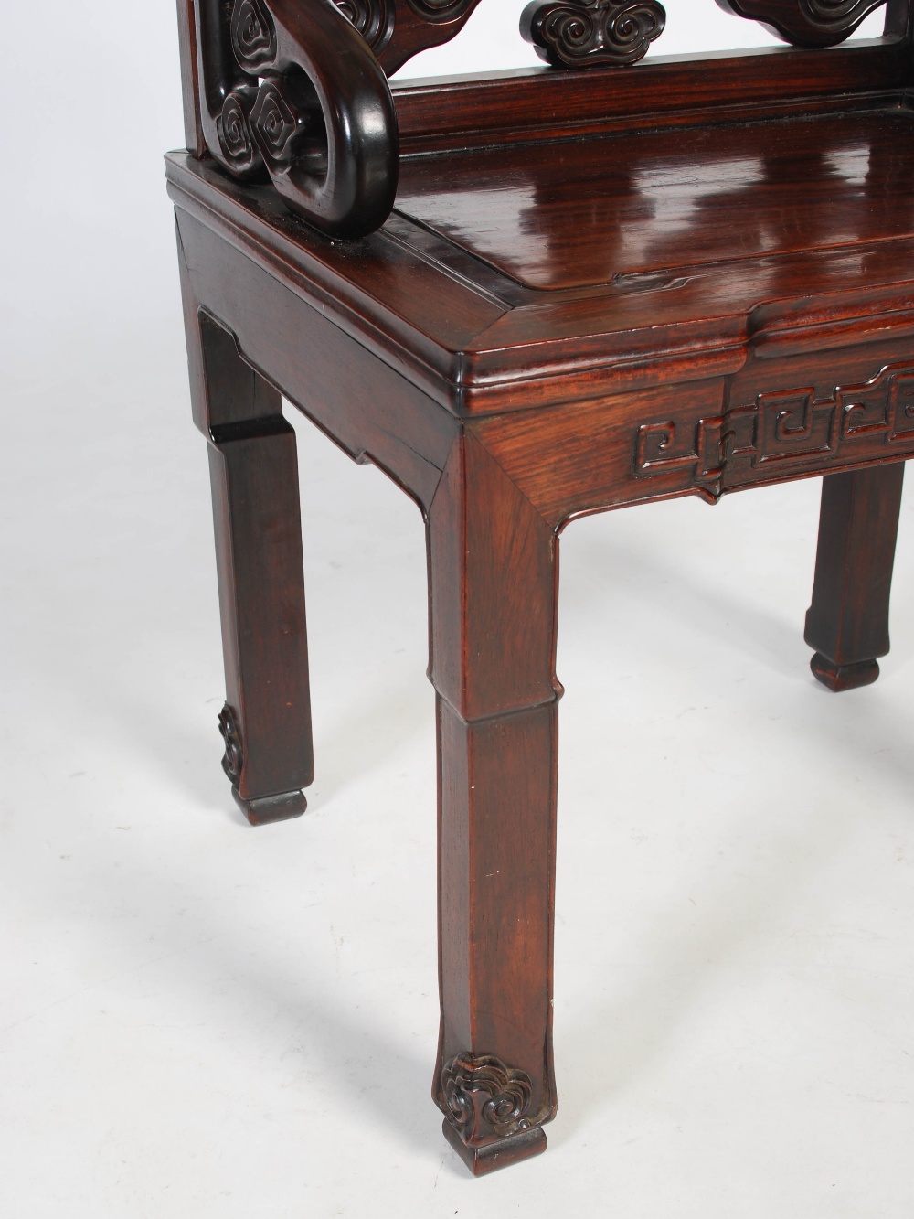 A Chinese hongmu chair, Qing Dynasty, early 19th century, the scroll carved back centred with a - Image 2 of 7