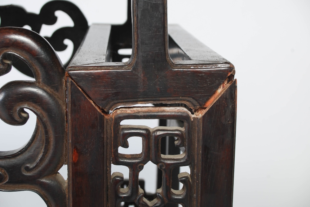 A Chinese dark wood table, late 19th/early 20th century, the rectangular panelled top above a - Image 8 of 10