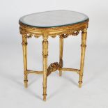 A late 19th century French Transitional style gilt wood occasional table, the oval top with pink