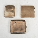 Three George V silver cigarette cases, comprising; a concave rectangular shaped case, Birmingham,