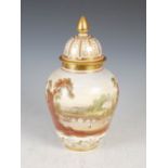 A 19th century hand painted English porcelain jar and cover, decorated with country house in