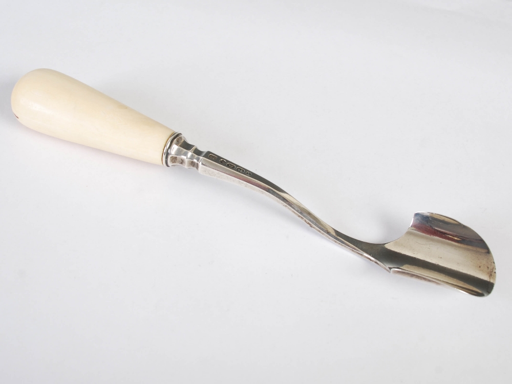 A Victorian silver and ivory stilton scoop, Birmingham, 1868, makers mark of J.G, 21.5cm long.