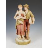 A Royal Dux porcelain figure group of shepherd and shepherdess, applied and impressed triangular