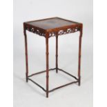 A Chinese dark wood tall square urn table, Qing Dynasty, the square panelled top above a pierced and