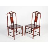 A pair of Chinese dark wood and burr wood side chairs, 20th century, the scroll carved top rails