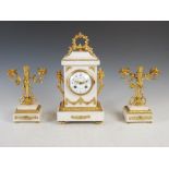 A late 19th century French white marble and ormolu mounted clock garniture, the clock with a