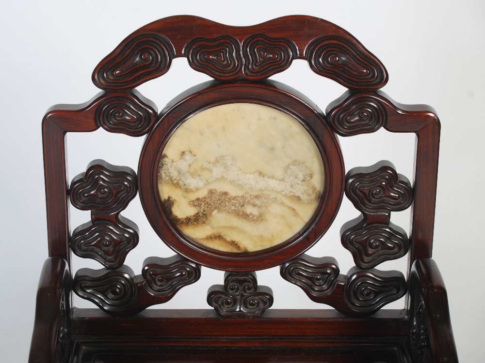 A Chinese hongmu chair, Qing Dynasty, early 19th century, the scroll carved back centred with a - Image 6 of 7