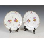 A pair of late 19th century Vienna porcelain dishes, decorated with scattered sprays of deutsche