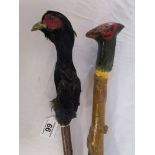 2 pheasant head walking sticks