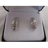 White gold diamond stud earrings with baguette stones approx 1ct ( 120 diamonds )