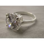 Silver stone set solitaire ring