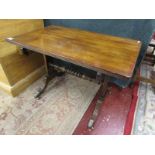 Regency style coffee table on casters