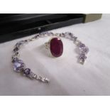 Silver bracelet set with amethyst coloured stones & silver ring set with large oval ruby