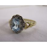 Gold blue topaz & diamond cluster ring