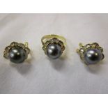 18ct gold baguette diamond & black pearl set ring together with a matching pair of earrings