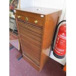 Mahogany tambour front cabinet with key