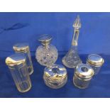 Collection of silver mounted / lidded bottles