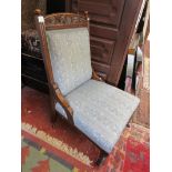 Edwardian oak nursing chair