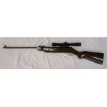 Air rifle with scope