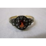 15ct gold garnet & diamond set ring