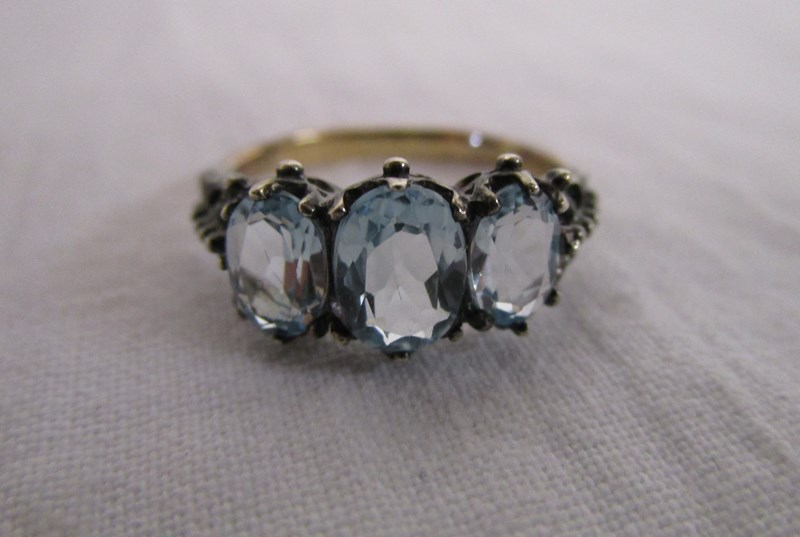 15ct gold 3 stone blue topaz ring