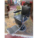Vintage barbers chair by L A Reine